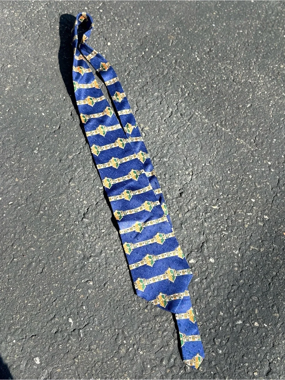 Oscar de la Renta Blue Tie with Gold and Green Crest Motif